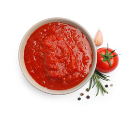 Homemade tomato sauce in bowl and fresh ingredients isolated on white, top view