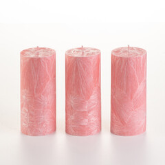 Two artisan pink palm wax candles, perfect for daily comfort and excellent gift choice, presented...
