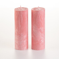 Handmade pink palm wax candles for comfort on white