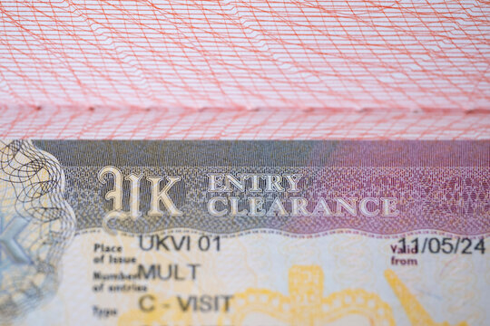 British tourist visa in passport, United Kingdom travel multivisa close-up, travel permit, pass border control, international voyage, UK entry
