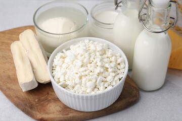 Different fresh dairy products on light table