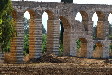 An ancient aqueduct for supplying water to populated areas.