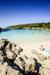 Cala Talaier, sandy beach with tourists, Ciutadella, Menorca, Balearic Islands, Spain, Europe. >