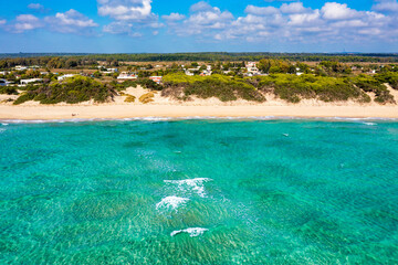 Punta Prosciutto azure sea water, crystal clear water on beach Punta Prosciutto, Italian Maldives Puglia Italy. Punta Prosciutto in Apulia, one of the most beautiful beaches of Italy.