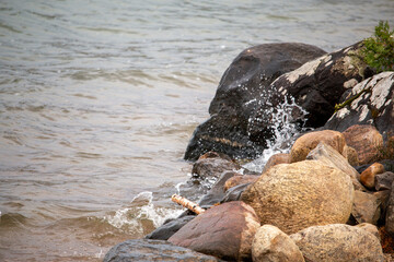 Waves Crash Along The Coastline