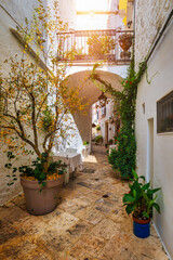 Scenic sight in Locorotondo, Bari Province, Apulia (Puglia), Italy. Characteristic streets in the...