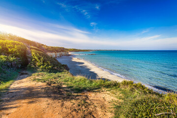 Fototapeta na wymiar View of Baia dei Turchi, Puglia region, Italy. Turkish Bay (or Baia dei Turchi), this coast of Apulia is one of the most important ecosystems in Salento, Italy. Seacoast of Baia dei Turchi.