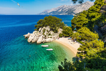 Amazing aerial view of the beautiful Podrace beach in Brela, Makarska Riviera, Croatia. Aerial view...