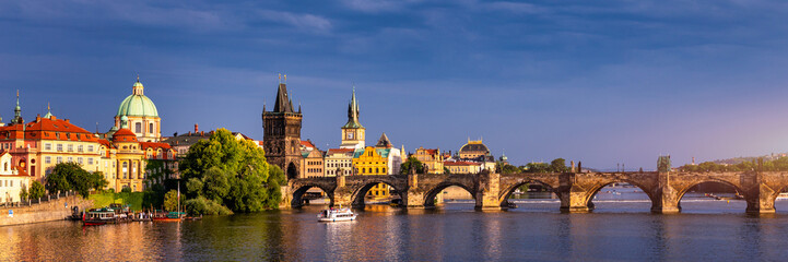 Charles Bridge sunset view of the Old Town pier architecture, Charles Bridge over Vltava river in...