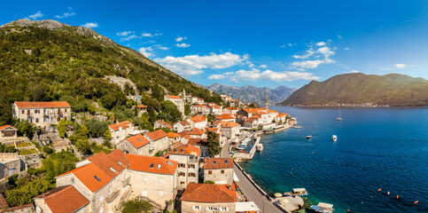 View of the historic town of Perast at famous Bay of Kotor on a beautiful sunny day with blue sky...