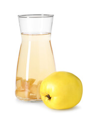 Tasty quince drink in glass carafe and fresh fruit isolated on white