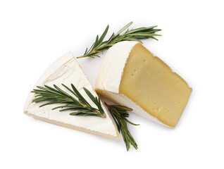 Pieces of tasty camembert cheese and rosemary isolated on white, top view