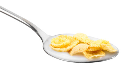 Breakfast cereal. Corn flakes and milk in spoon isolated on white