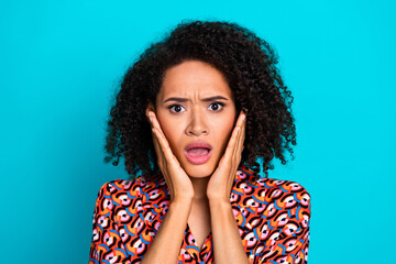 Photo of impressed girly lady wear print shirt arms cheeks open mouth isolated blue color background