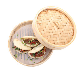 Delicious gua bao (pork belly buns) in bamboo steamer isolated on white, top view