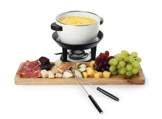 Fondue with tasty melted cheese, forks and different snacks isolated on white