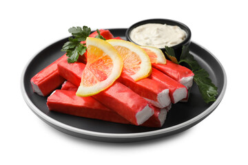 Tasty crab sticks, sauce, pieces of lemon and parsley isolated on white