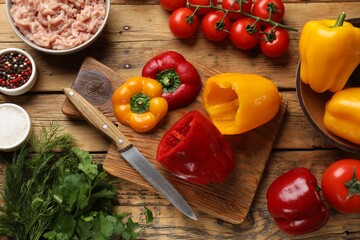Making stuffed peppers. Vegetables and ground meat on wooden table, flat lay