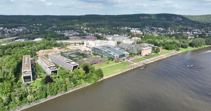 Aerial drone view of the city of Bonn, Germany looking at the buildings at the Am Bonner Bogen along the rhine river.
