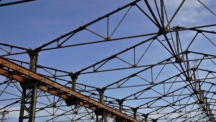 metal structure roof of factory beams in ruins