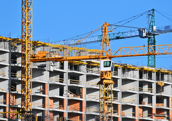 Crane and building construction site