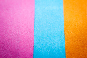 Extreme macro of multicolor background from different colors papers
