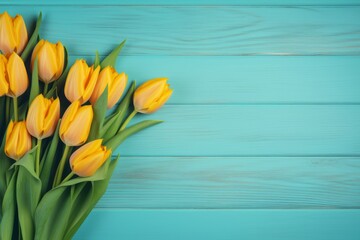 Yellow tulips flowers on turquoise wooden background. Generative AI