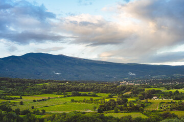 2024-05-15 A VEIW OF MOUNT VENTOUX AND THE BEDOIN AREA FROM THE HOTEL LA MAISONDE CRILLON WITH BEAUTIFUL CLOUDS AND A BLUE SKY