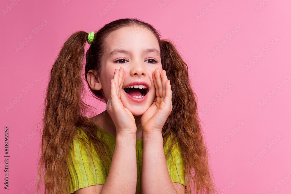 Canvas Prints Photo portrait of cute little girl scream share secret dressed stylish green clothes isolated on pink color background