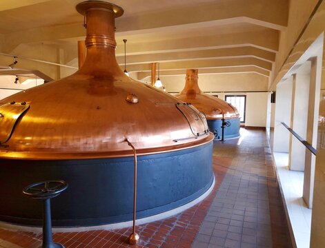 Interior of brewery with beer copper fermentation vats.