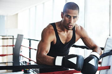 Latino man, boxer and portrait for fitness, exercise or training workout ready for fight at gym....