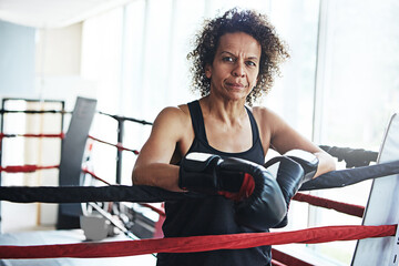 Mature woman, boxer and portrait for exercise, fitness or training workout ready for fight at gym....