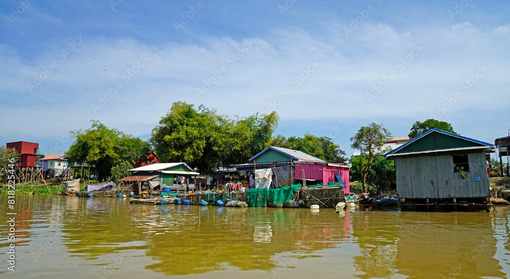 Wall mural poor fisherman village at the shore of tonle sap river in cambodia