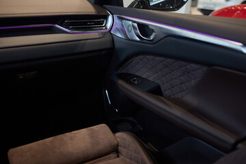 Automotive door with purple light, enhancing vehicle exterior design
