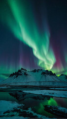 aurora borealis above the mountains