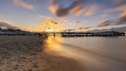 Sunset over the pier in Jelitkowo, Baltic coast