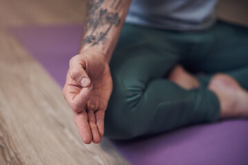Hands, meditate or person in home for yoga, wellness or spiritual mudra in lotus pose or zen gyan....