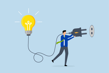 Problem solving idea, leader businessman combines the idea of electricity with light bulb lighting.