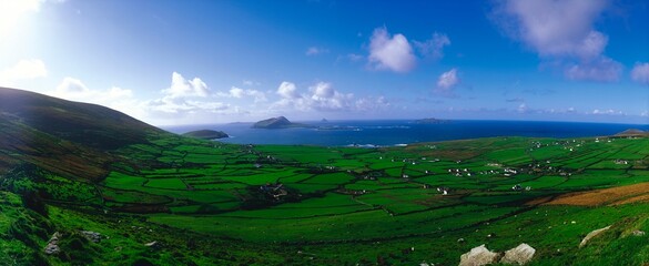 Fototapeta premium Dunquin, Blasket Islands, Dingle Peninsula, Co Kerry, Ireland; Longshot Of An Irish Landscape