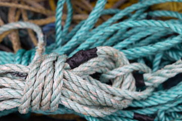 Closeup of tangled harbor fishing ropes