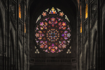 Stained glass rosetta window in Gothic cathedral