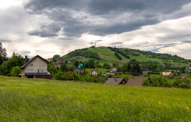 View from Koniak&oacute;w to Ochodzita under dramatic skies