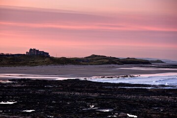 Obraz premium Seashore At Sunset, Northumberland, England