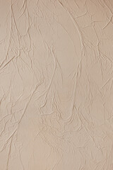 Decorative plaster on the wall as an abstract background. texture of a beige wall. grunge...