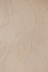Decorative plaster on the wall as an abstract background. texture of a beige wall. grunge decorative paper on wall. 