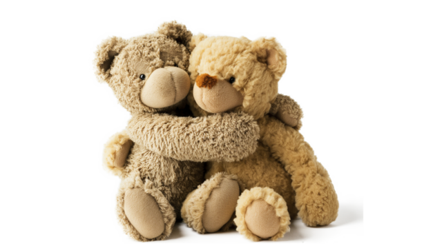 Sweet and Heartwarming Moment of Two Teddy Bears Hugging isolated on a transparent background
