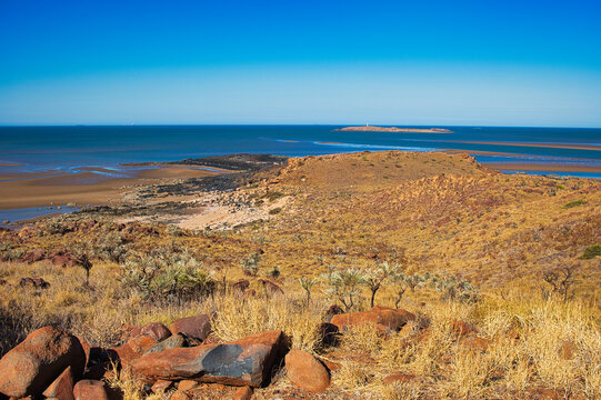 Reader Head, the remote cape at the mouth of the Harding River, near Cossack, Pilbara, Western Australia. In the distance Jarman Island lighthouse.
