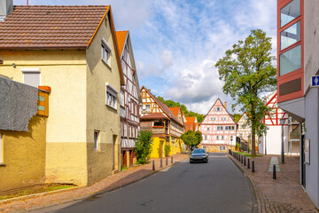 A street of half timber colorful homes in the medieval Bavarian village of Möckmühl, Germany.