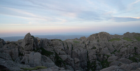 Panorama view of the rocky mountains under a magical sunset sky