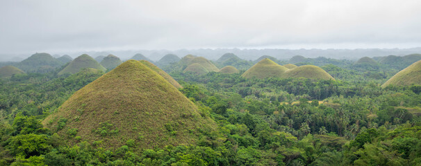 Views of the Chocolate Hills in Bohol, Philippines, during a cloudy spring day